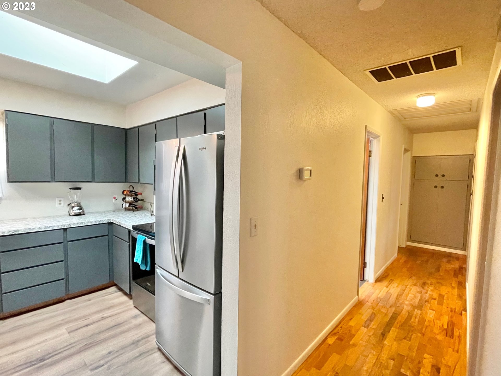 2113 Austin Road Roseburg, OR 97471 - Photo 14 of 36 a kitchen with a refrigerator and a sink