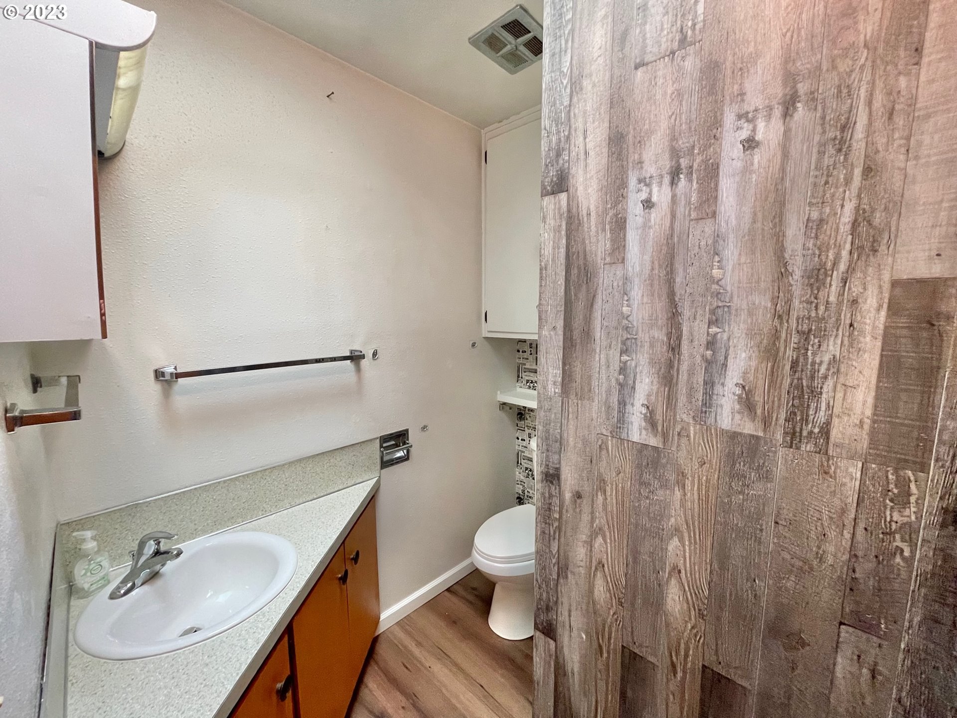 2113 Austin Road Roseburg, OR 97471 - Photo 22 of 36 a bathroom with a sink a toilet and shower curtain