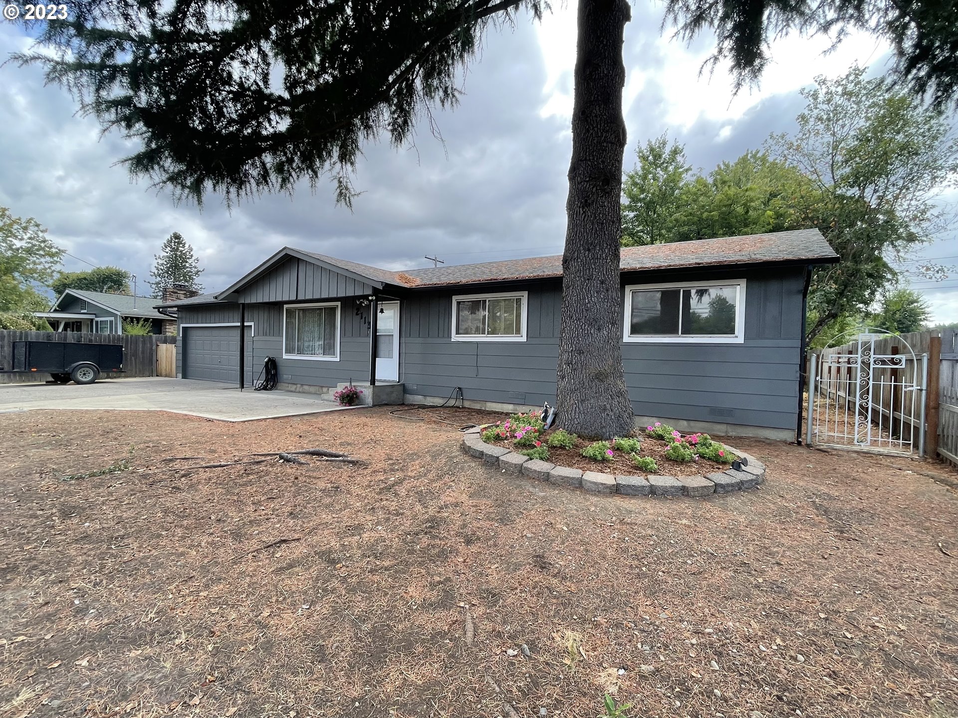 2113 Austin Road Roseburg, OR 97471 - Photo 3 of 36 a front view of a house with a yard