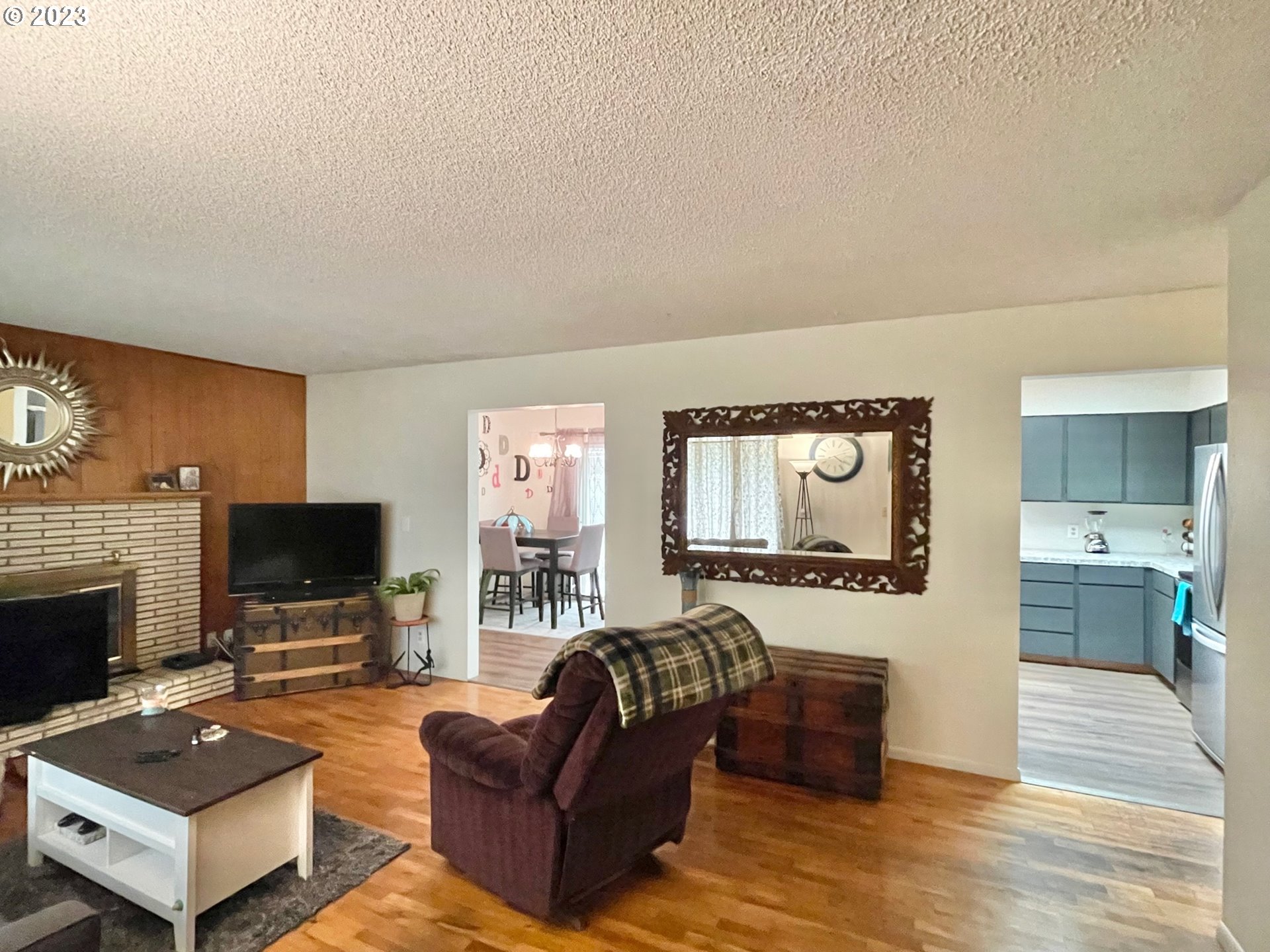 2113 Austin Road Roseburg, OR 97471 - Photo 5 of 36 a living room with furniture and a flat screen tv
