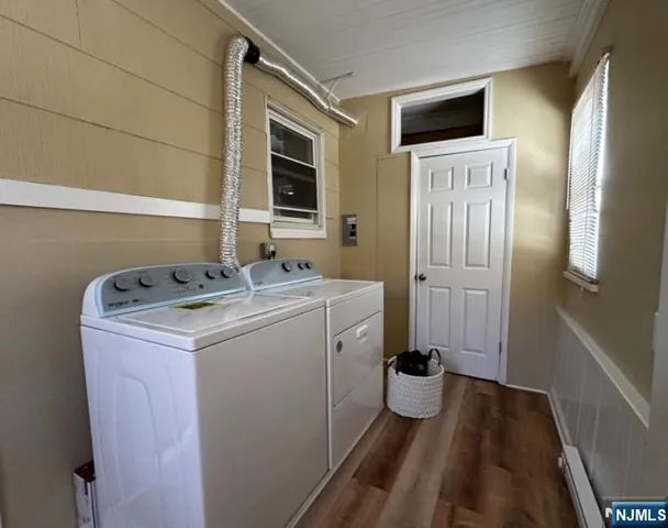 a utility room with dryer and washer