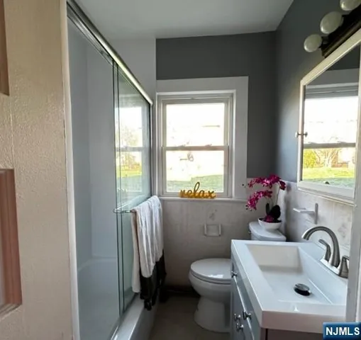 a bathroom with a sink toilet and a bathtub