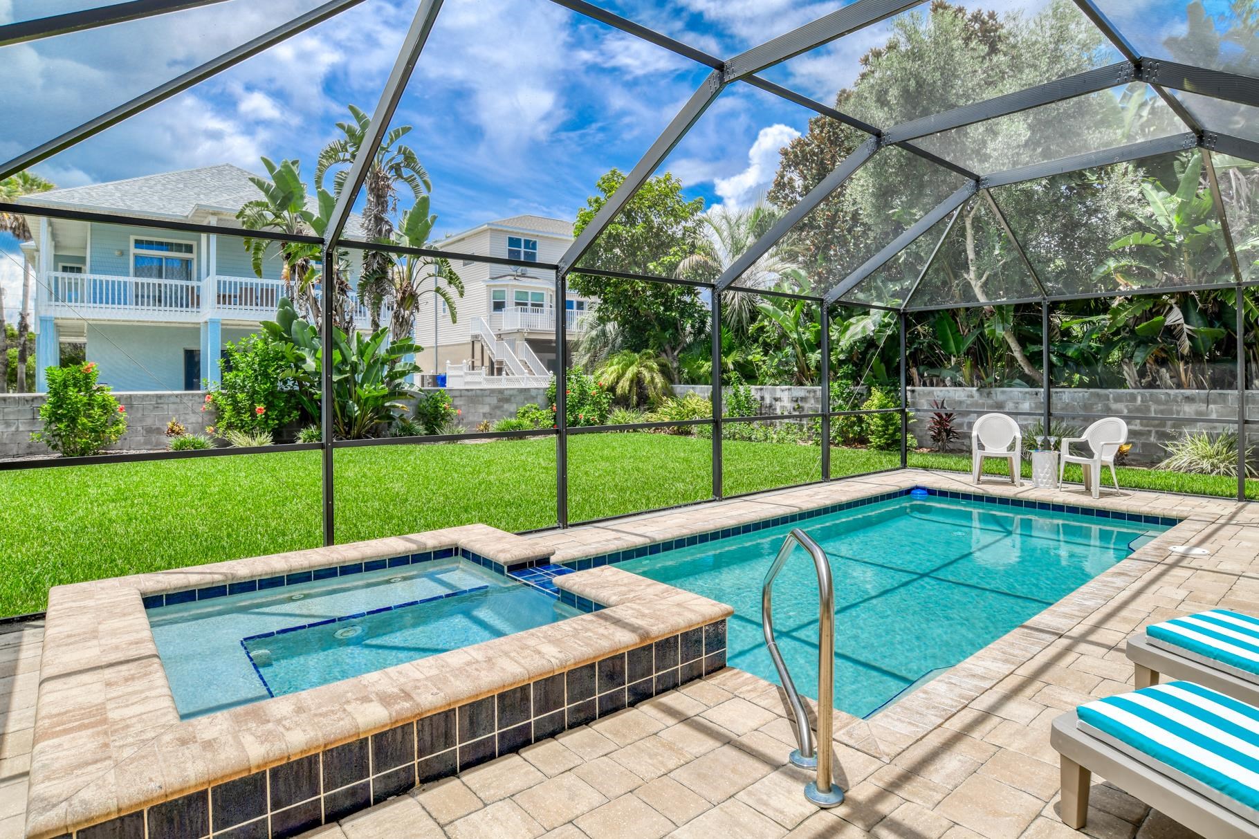 5067 Atlantic View St. Augustine, FL 32080 - Photo 12 of 47 a view of a backyard with a patio and garden