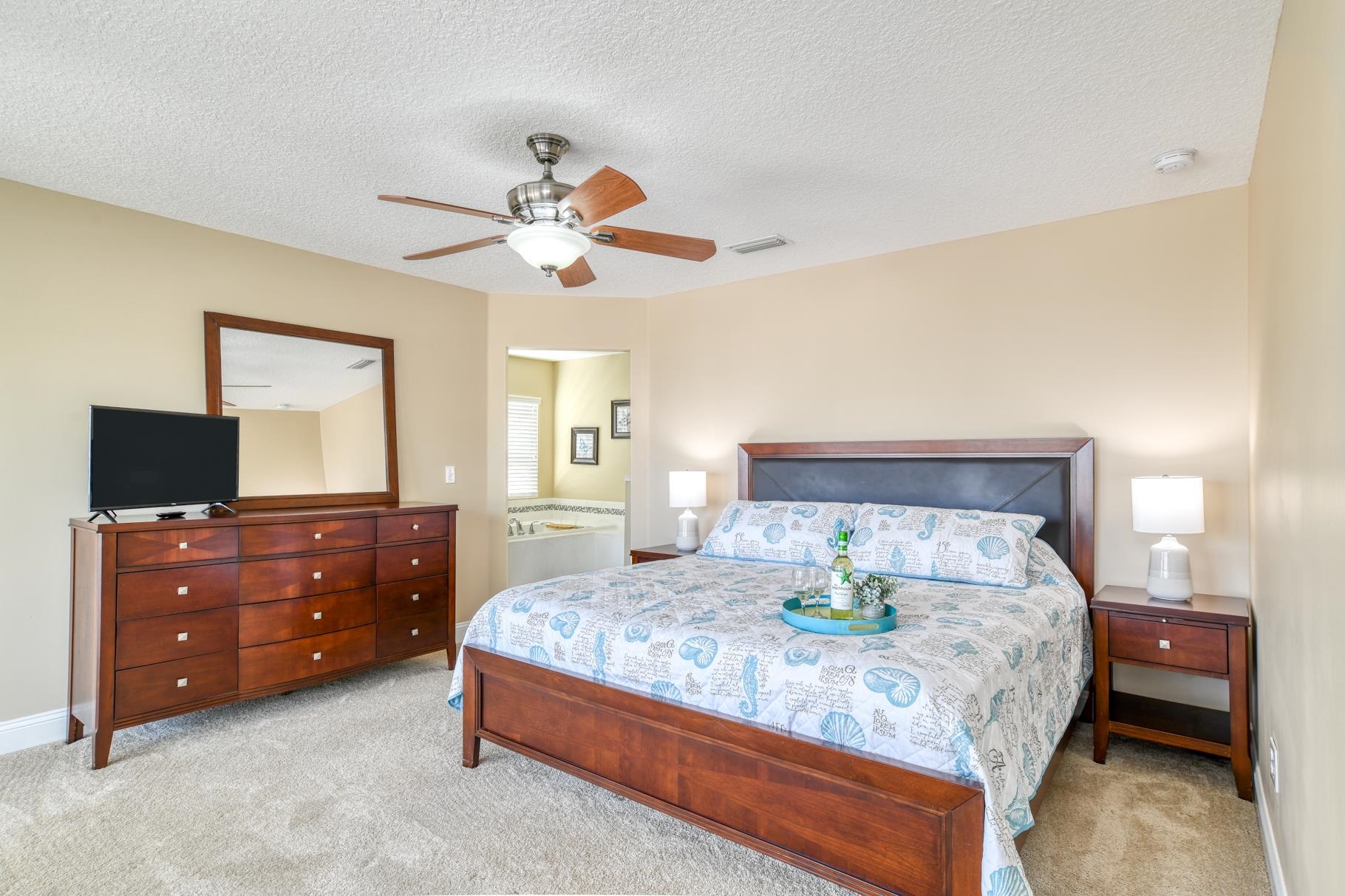 5067 Atlantic View St. Augustine, FL 32080 - Photo 17 of 47 a bedroom with a bed and a dresser