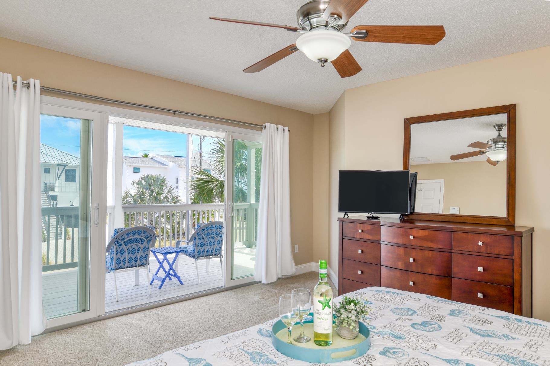 5067 Atlantic View St. Augustine, FL 32080 - Photo 18 of 47 a living room with furniture and a flat screen tv