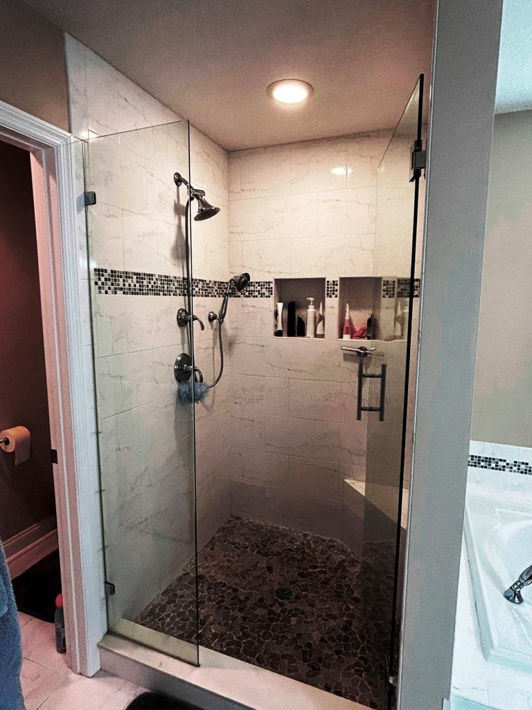 5067 Atlantic View St. Augustine, FL 32080 - Photo 22 of 47 a bathroom with a shower