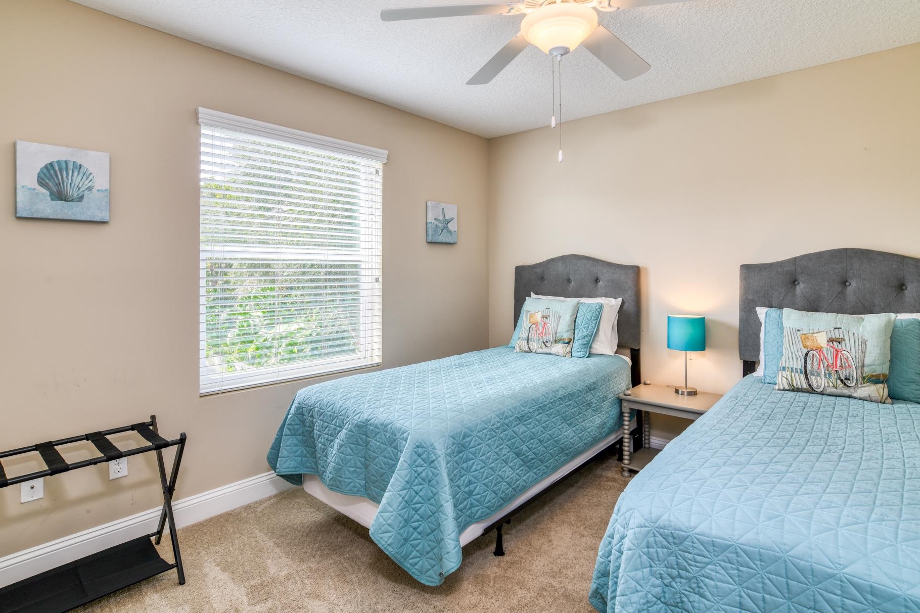 5067 Atlantic View St. Augustine, FL 32080 - Photo 23 of 47 a bedroom with a bed and a chandelier
