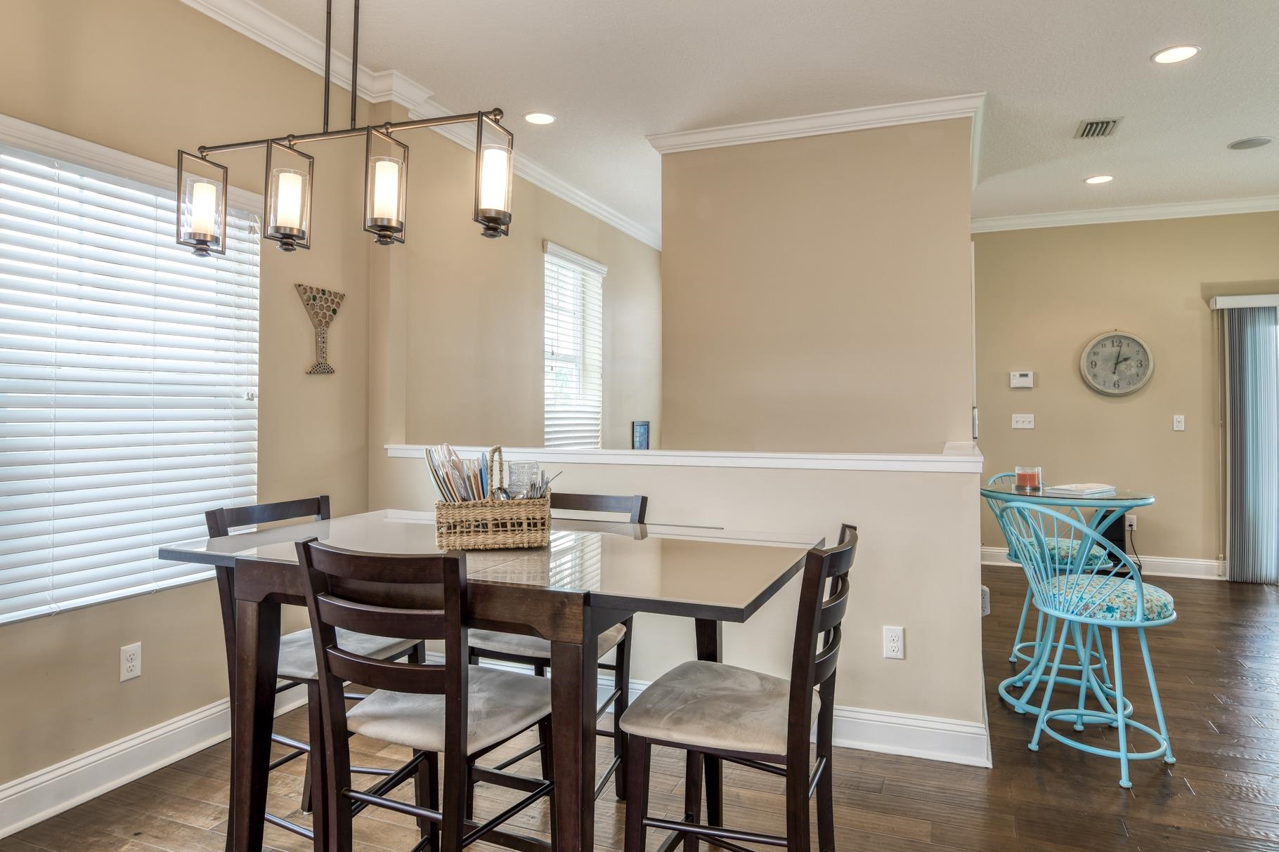 5067 Atlantic View St. Augustine, FL 32080 - Photo 29 of 47 a view of a dining room with furniture and wooden floor
