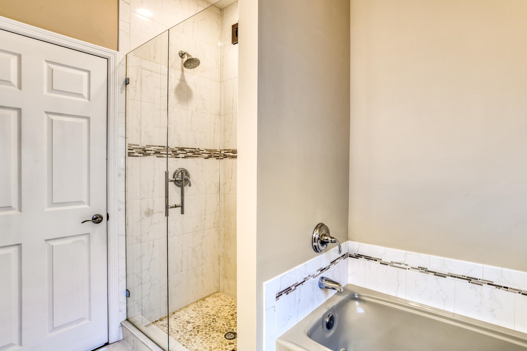 5067 Atlantic View St. Augustine, FL 32080 - Photo 33 of 47 a bathroom with a tub and shower