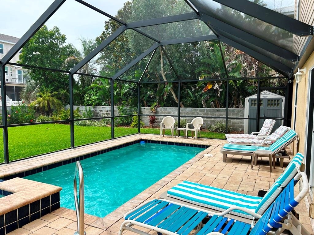 5067 Atlantic View St. Augustine, FL 32080 - Photo 38 of 47 a small view of a backyard with swimming pool