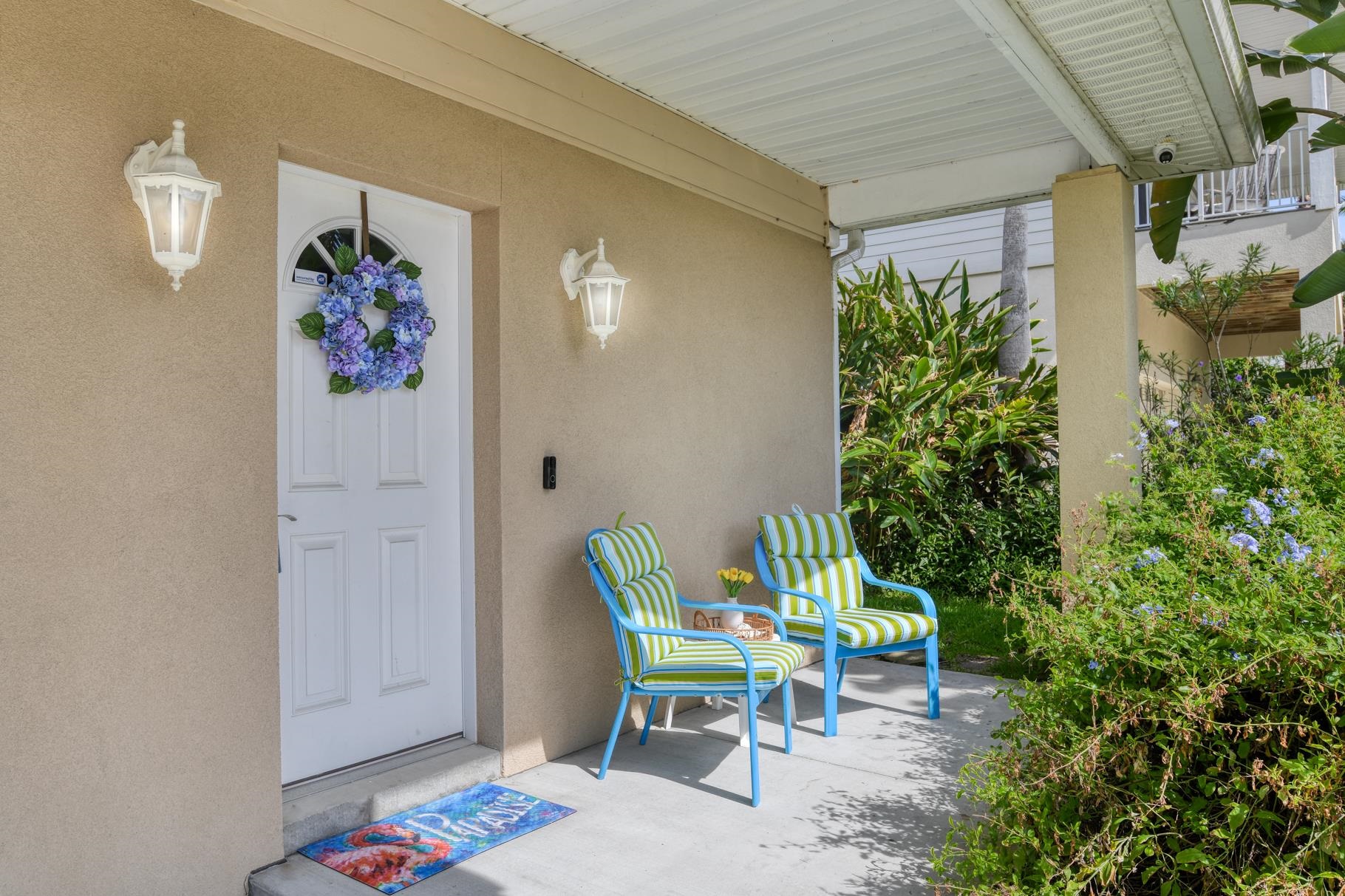 5067 Atlantic View St. Augustine, FL 32080 - Photo 10 of 47 a patio with table and chairs and potted plants