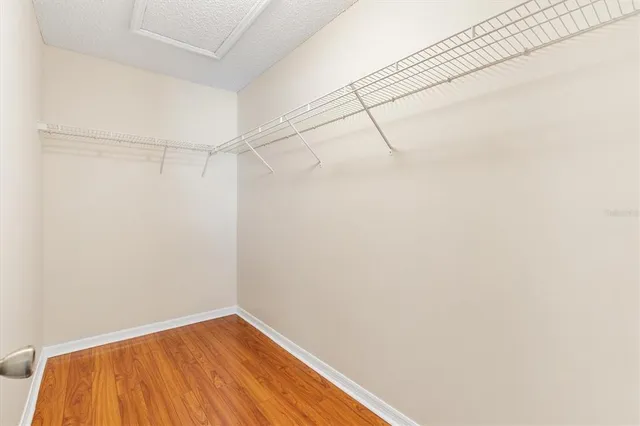 a view of a room with racks on the wall