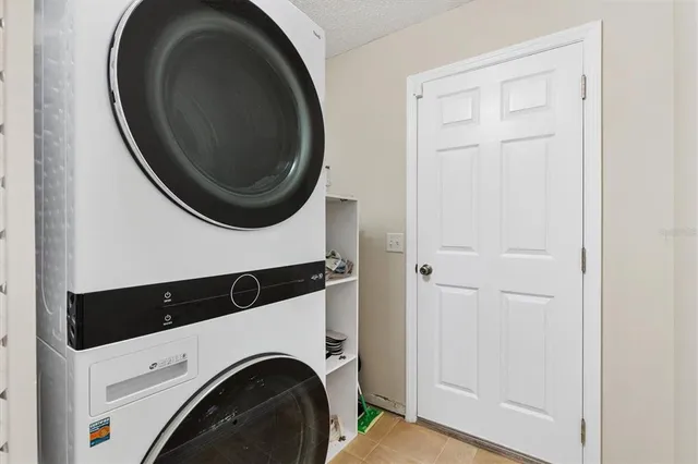a view of a storage & utility room with washer and dryer