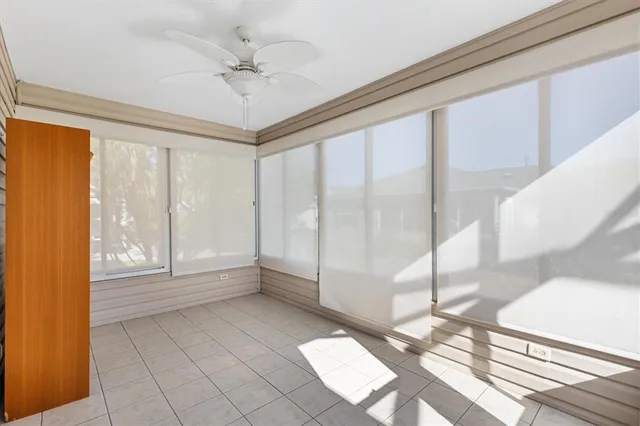 a view of an empty room and window