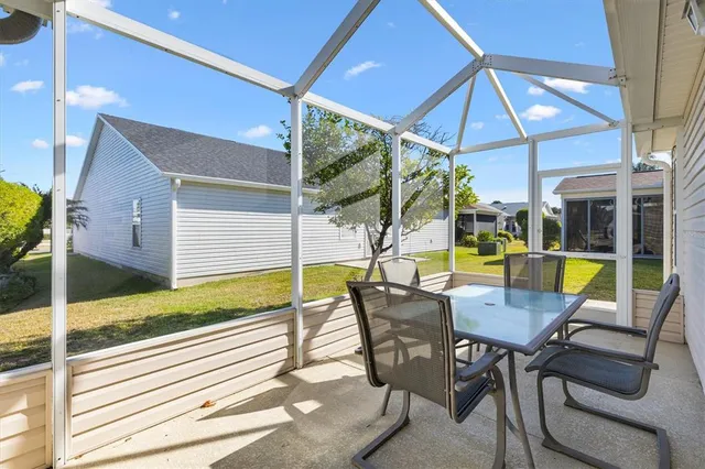 a view of a swimming pool with a lounge chairs