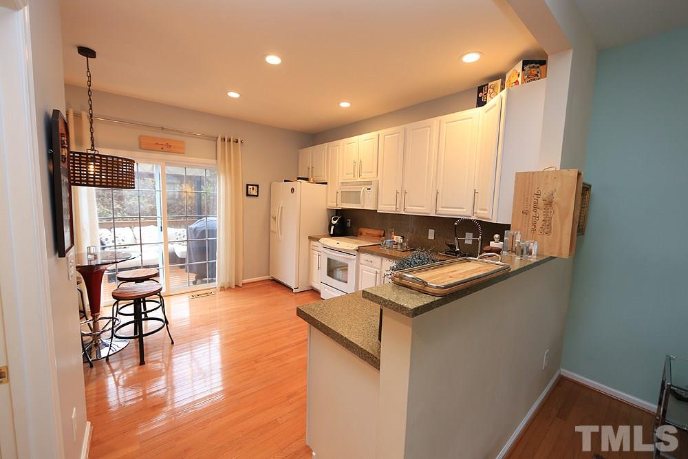 5413 Echo Ridge Road Raleigh, NC 27612 - Photo 14 of 29 Open to living and dining space