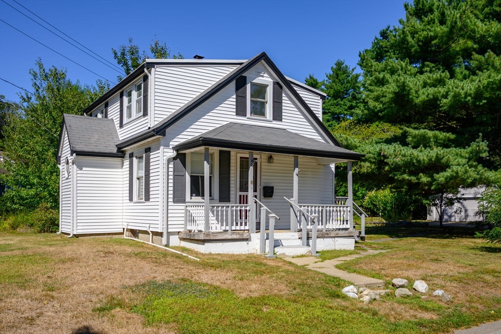 8 Walnut Street Whitman, MA 02382 - Photo 2 of 17 a front view of a house with a yard and porch