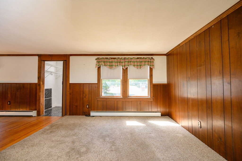 8 Walnut Street Whitman, MA 02382 - Photo 7 of 17 an empty room with a window and doors