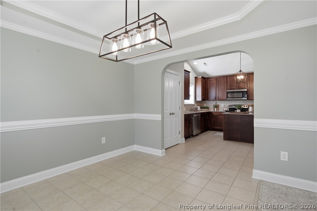 415 Colonist Place Cameron, NC 28326 - Photo 17 of 49 a view of a kitchen with a sink and cabinets