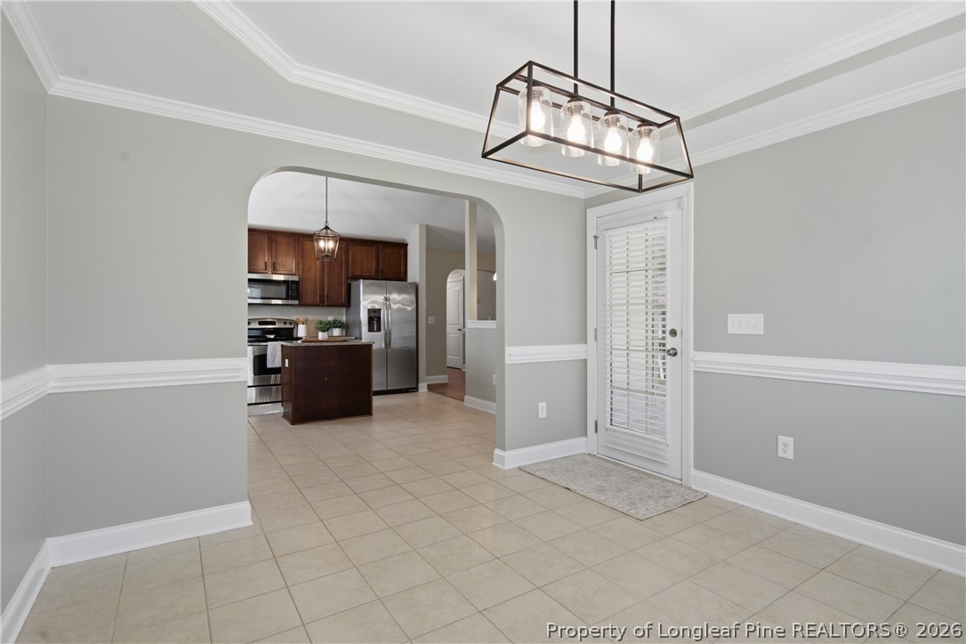 415 Colonist Place Cameron, NC 28326 - Photo 18 of 49 a open kitchen with cabinets and stainless steel appliances