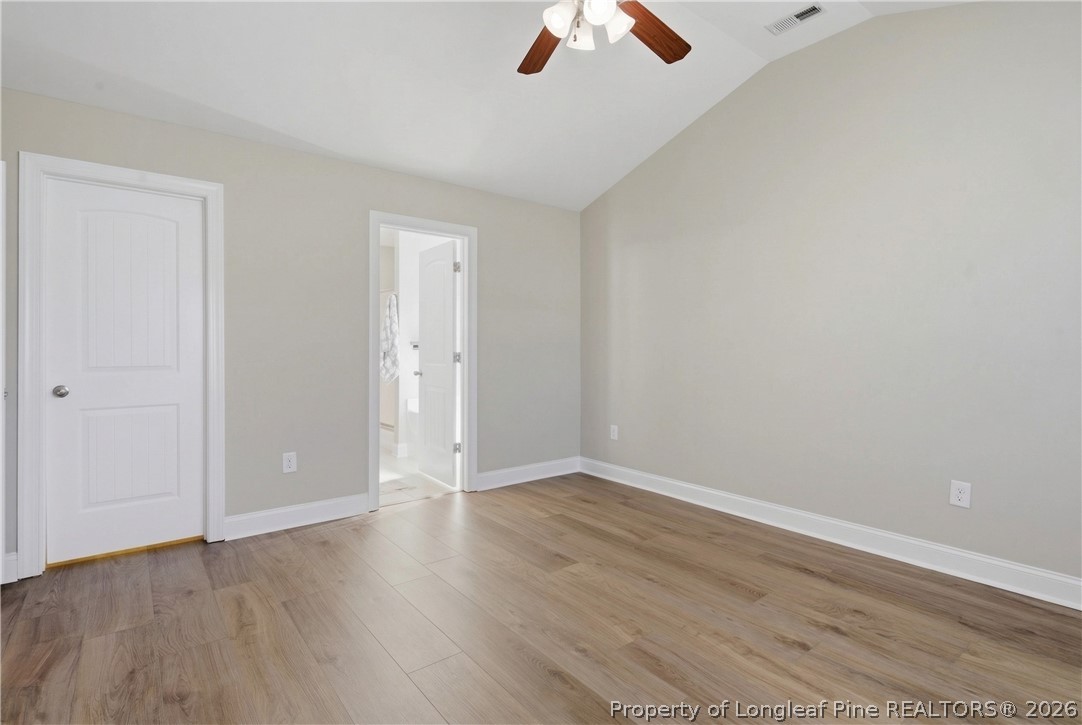 415 Colonist Place Cameron, NC 28326 - Photo 22 of 49 wooden floor in an empty room