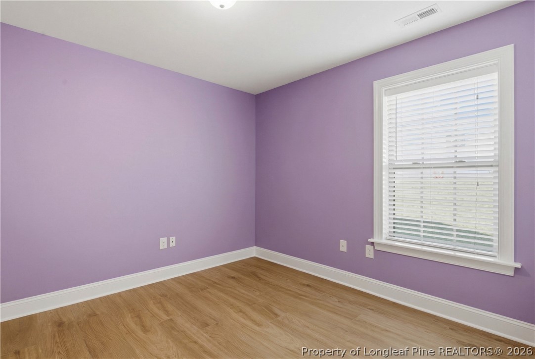 415 Colonist Place Cameron, NC 28326 - Photo 29 of 49 a view of an empty room with a window