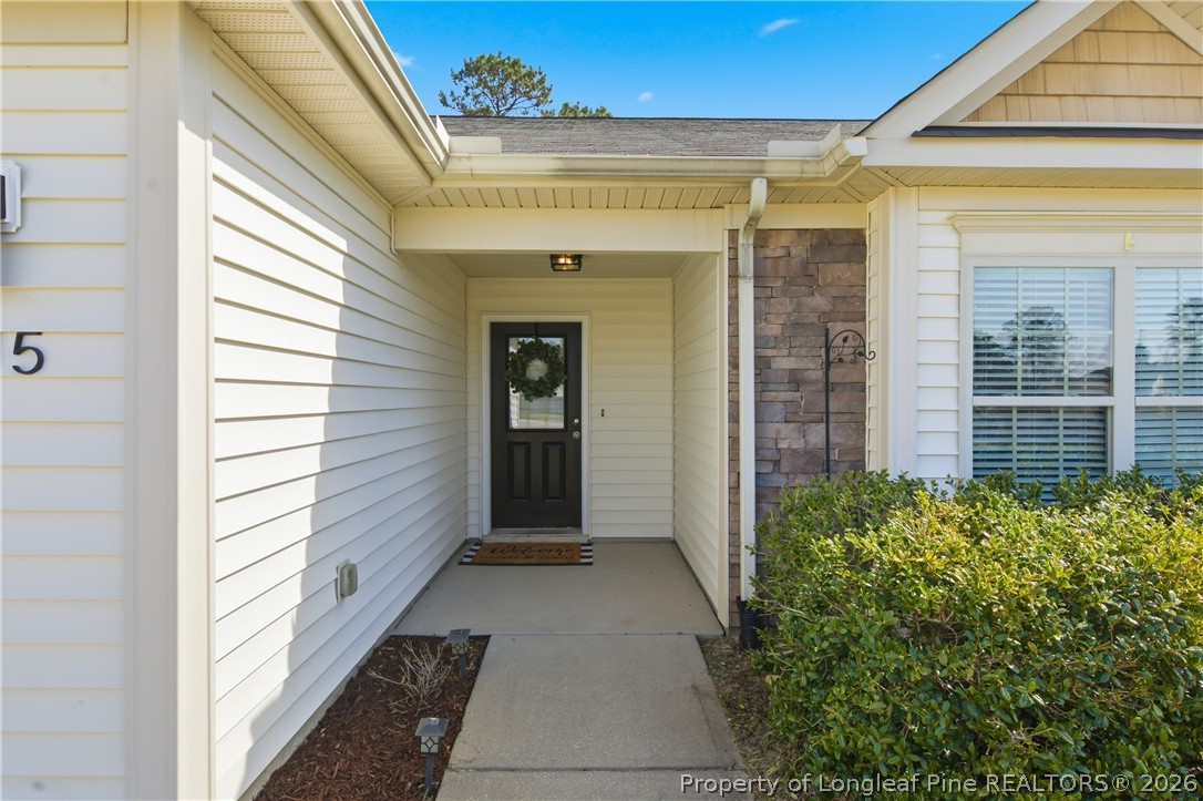 415 Colonist Place Cameron, NC 28326 - Photo 45 of 49 a view of a entryway door front of house