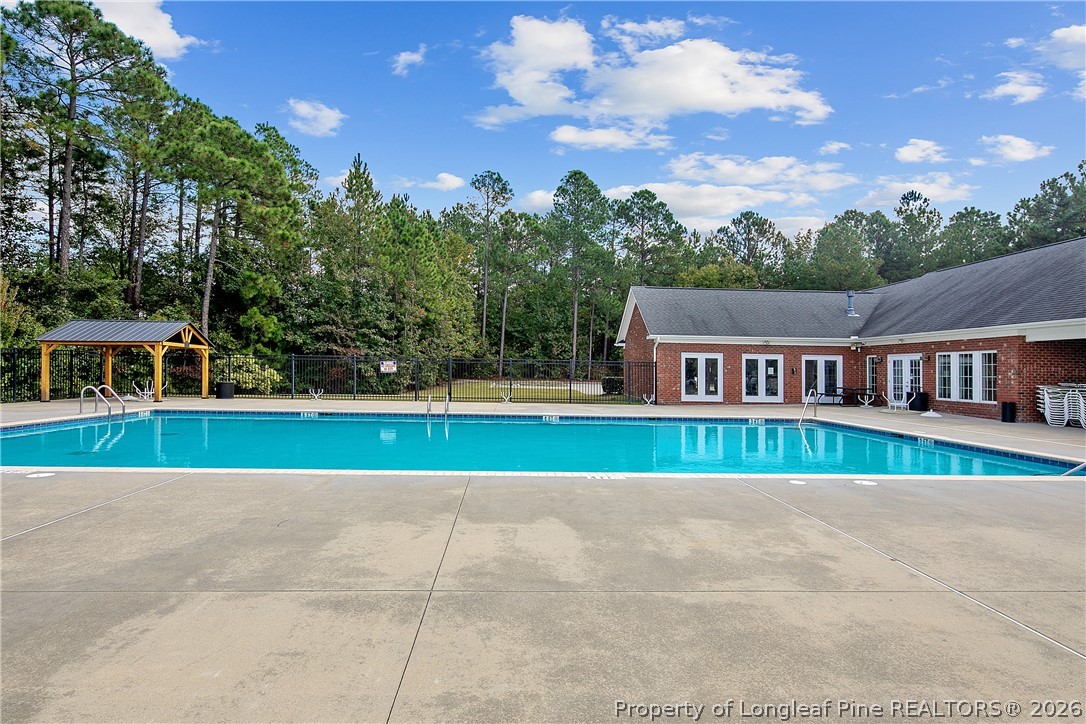 415 Colonist Place Cameron, NC 28326 - Photo 46 of 49 a view of house with a yard