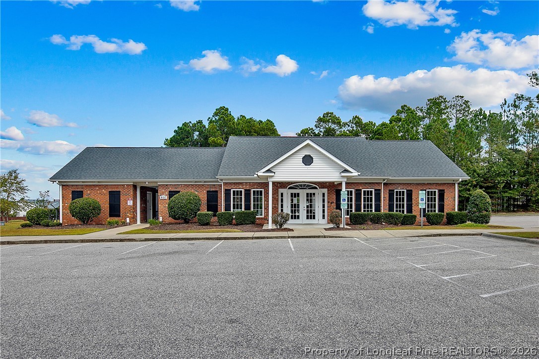 415 Colonist Place Cameron, NC 28326 - Photo 48 of 49 a front view of a house with a yard