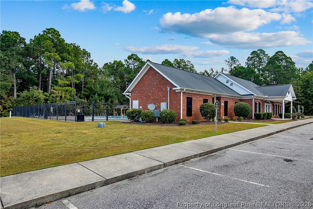 415 Colonist Place Cameron, NC 28326 - Photo 49 of 49 a front view of house with yard and green space