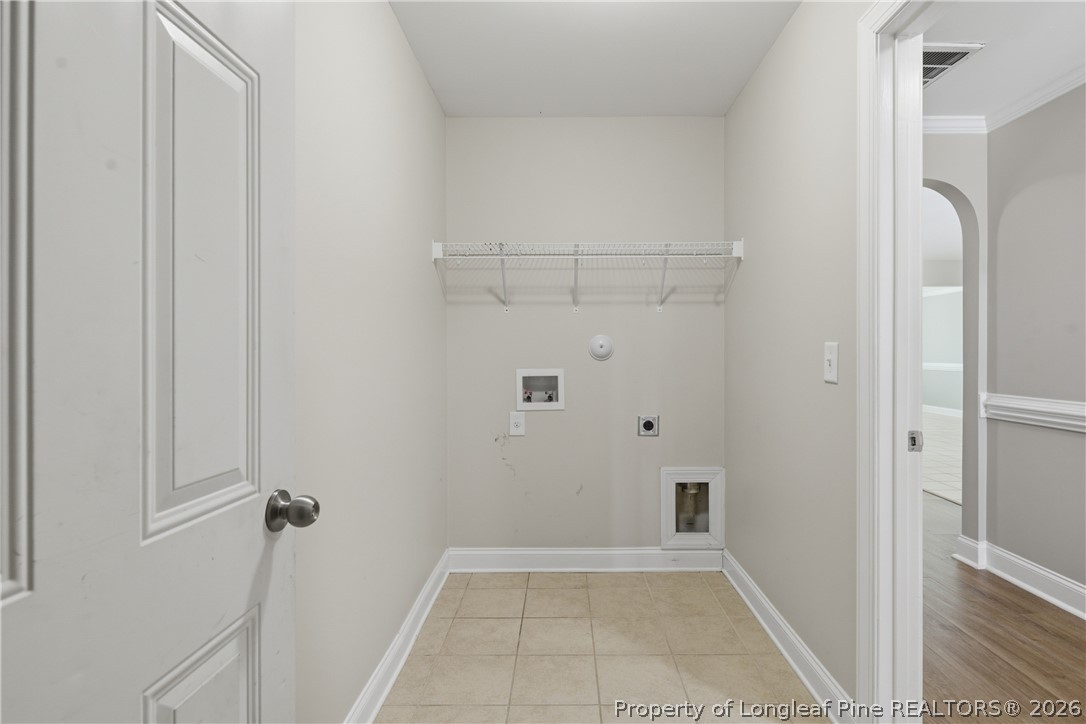 415 Colonist Place Cameron, NC 28326 - Photo 5 of 49 a view of a closet area