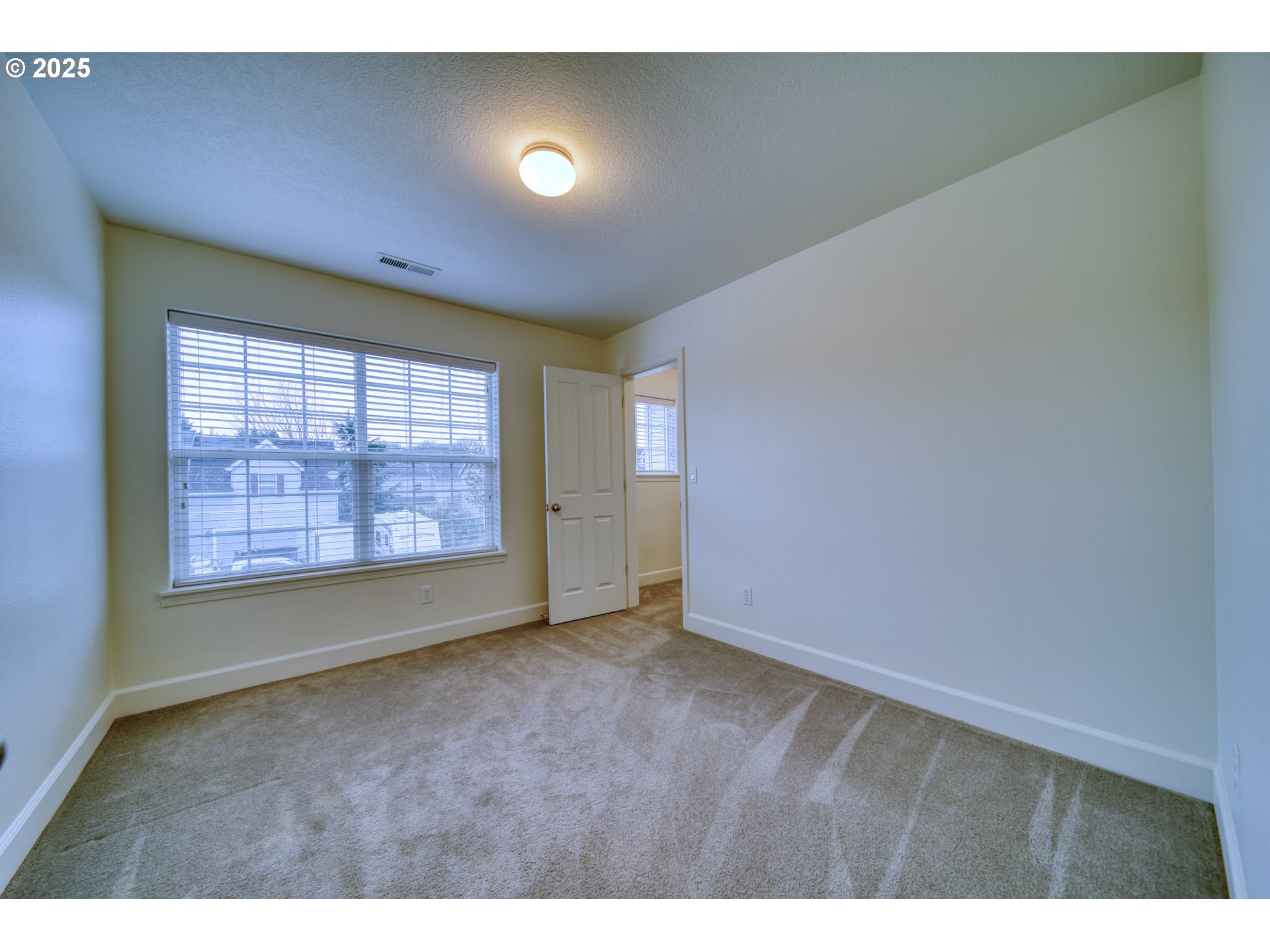 52036 Southeast Icenogle Loop Scappoose, OR 97056 - Photo 25 of 41 a view of an empty room with a window