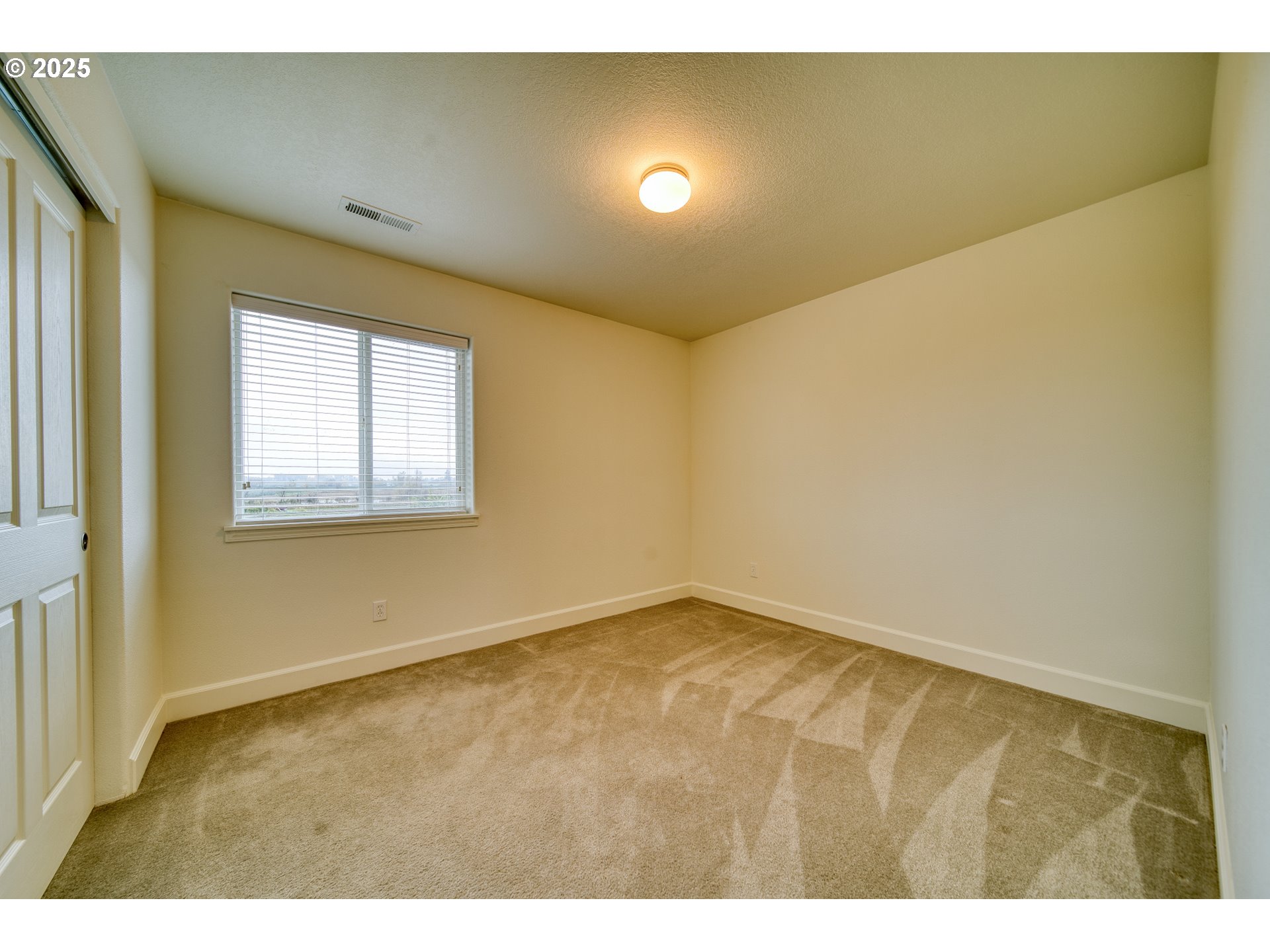 52036 Southeast Icenogle Loop Scappoose, OR 97056 - Photo 30 of 41 a view of an empty room and window