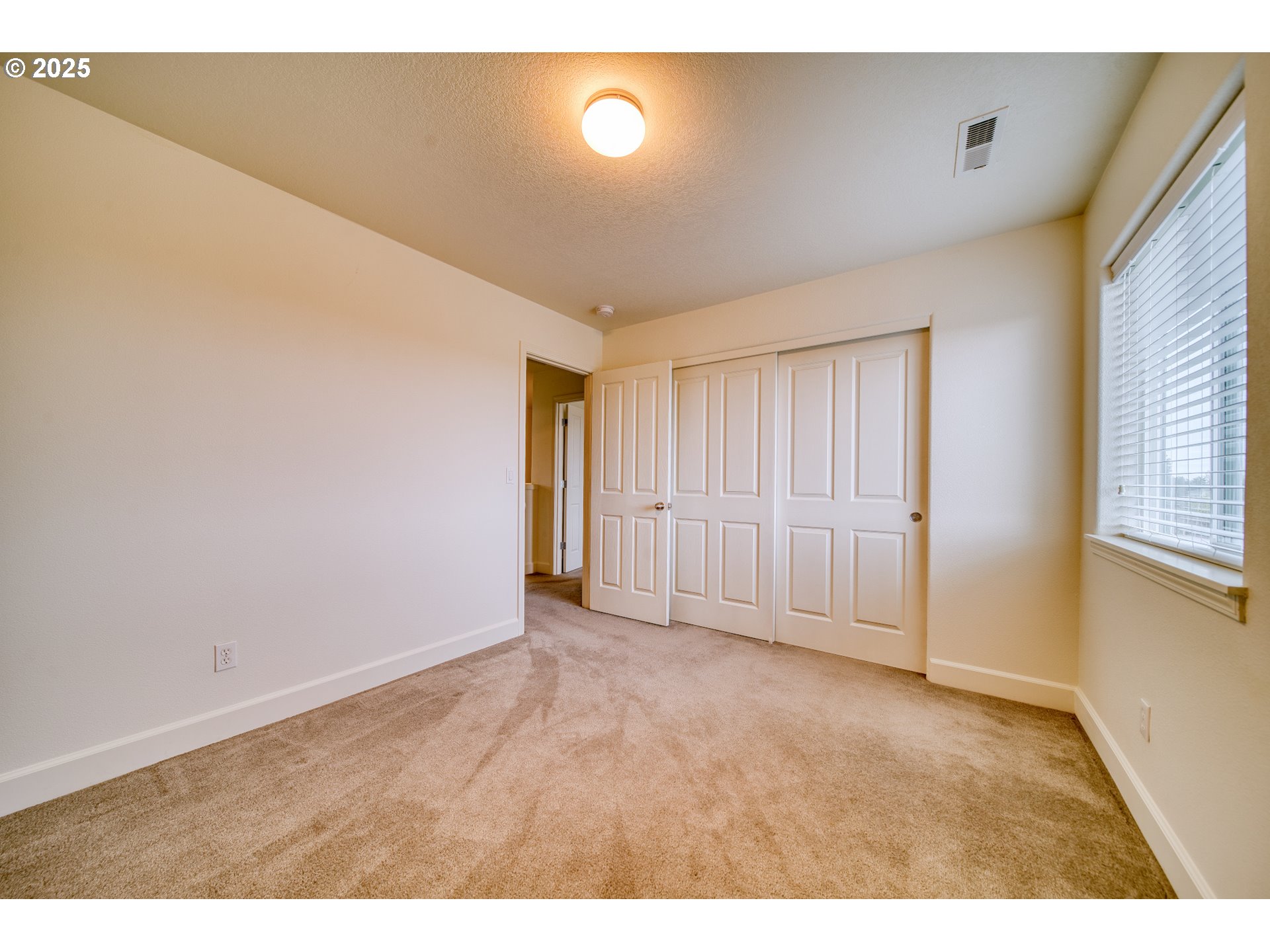 52036 Southeast Icenogle Loop Scappoose, OR 97056 - Photo 31 of 41 a view of an empty room with a window