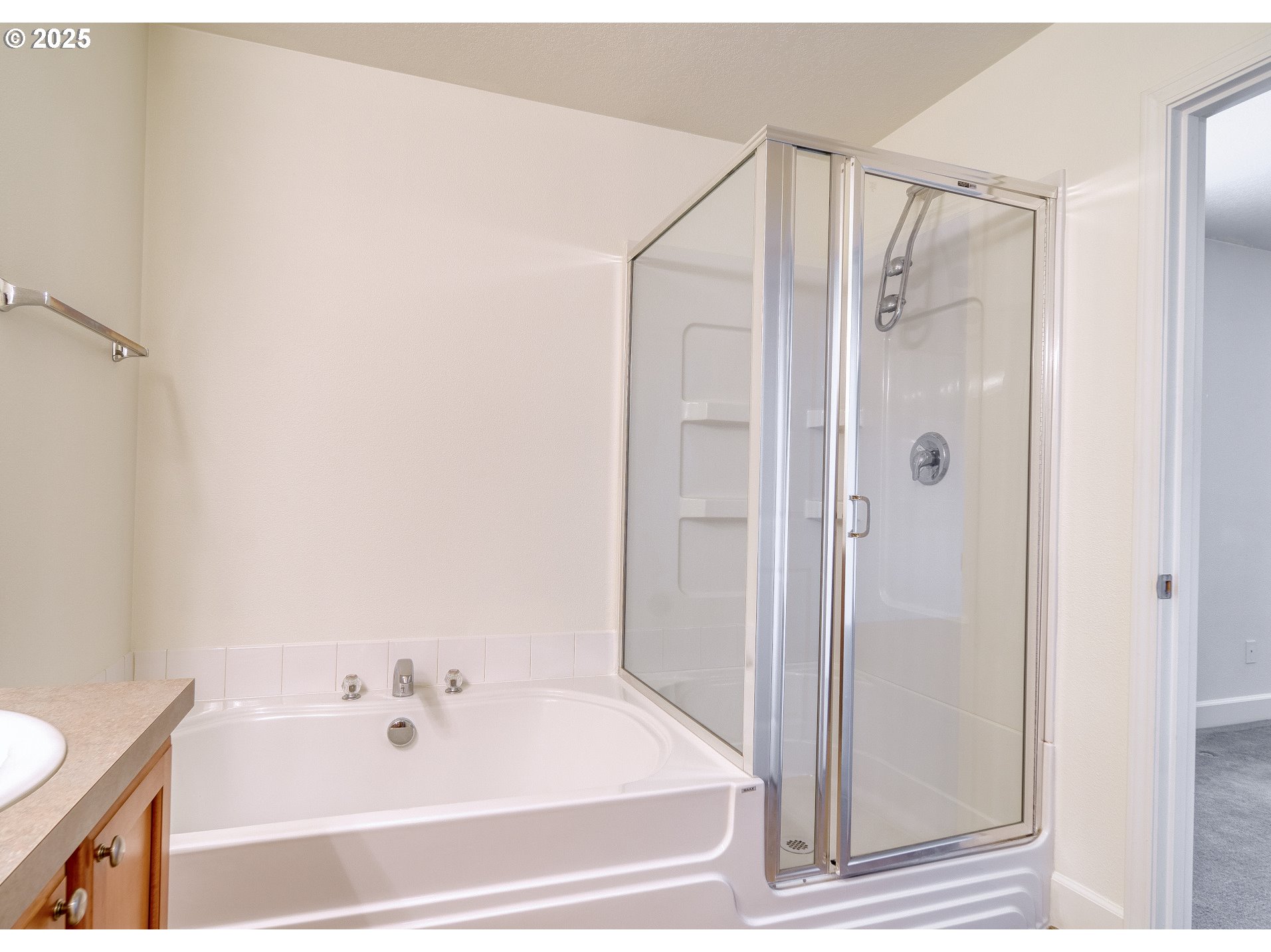 52036 Southeast Icenogle Loop Scappoose, OR 97056 - Photo 34 of 41 a bathroom with a tub and shower