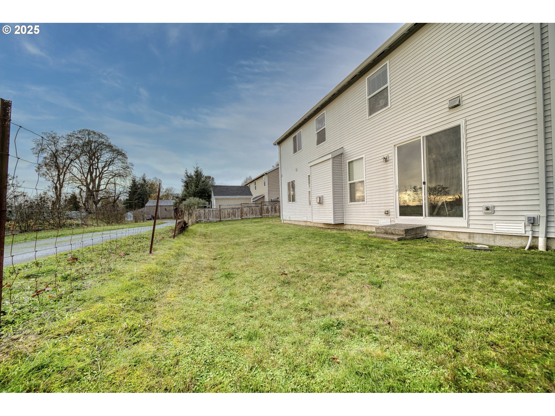 52036 Southeast Icenogle Loop Scappoose, OR 97056 - Photo 39 of 41 a view of a house with a backyard