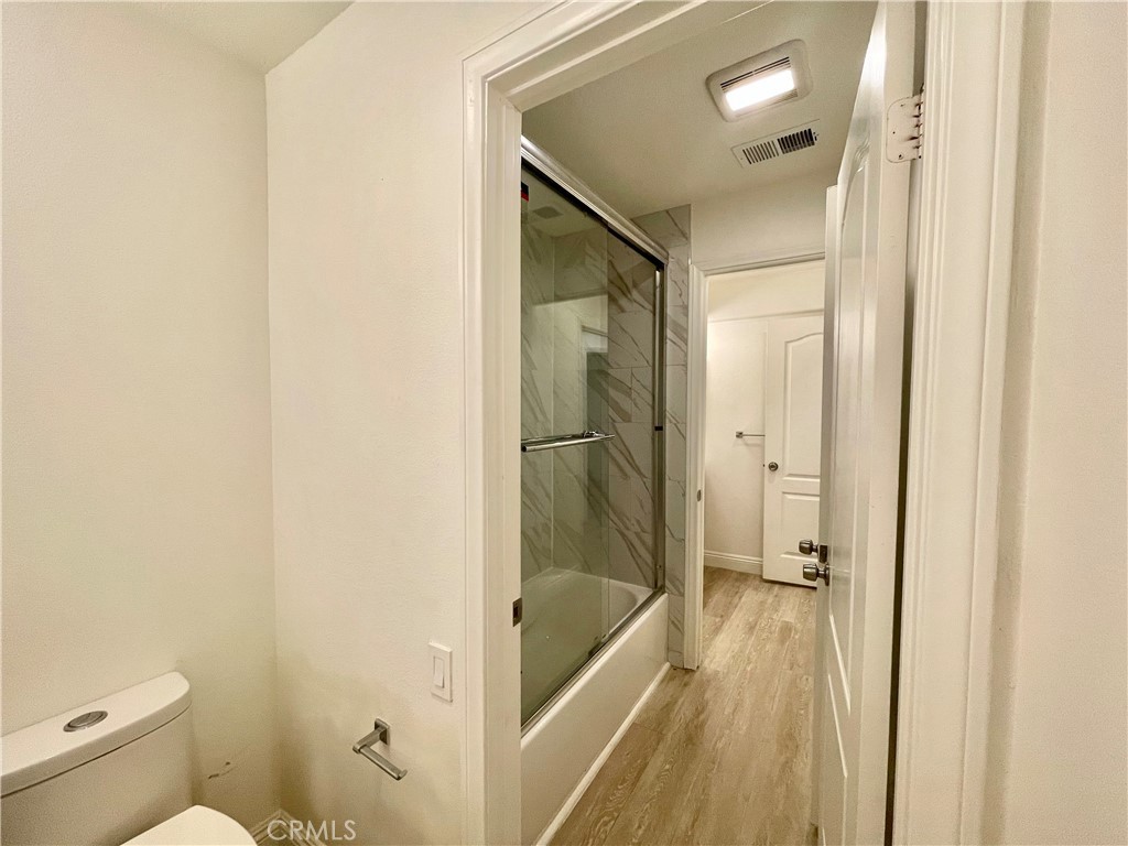 352 Y Place, Unit B Laguna Beach, CA 92651 - Photo 15 of 20 a bathroom with a tub shower vanity and a sink
