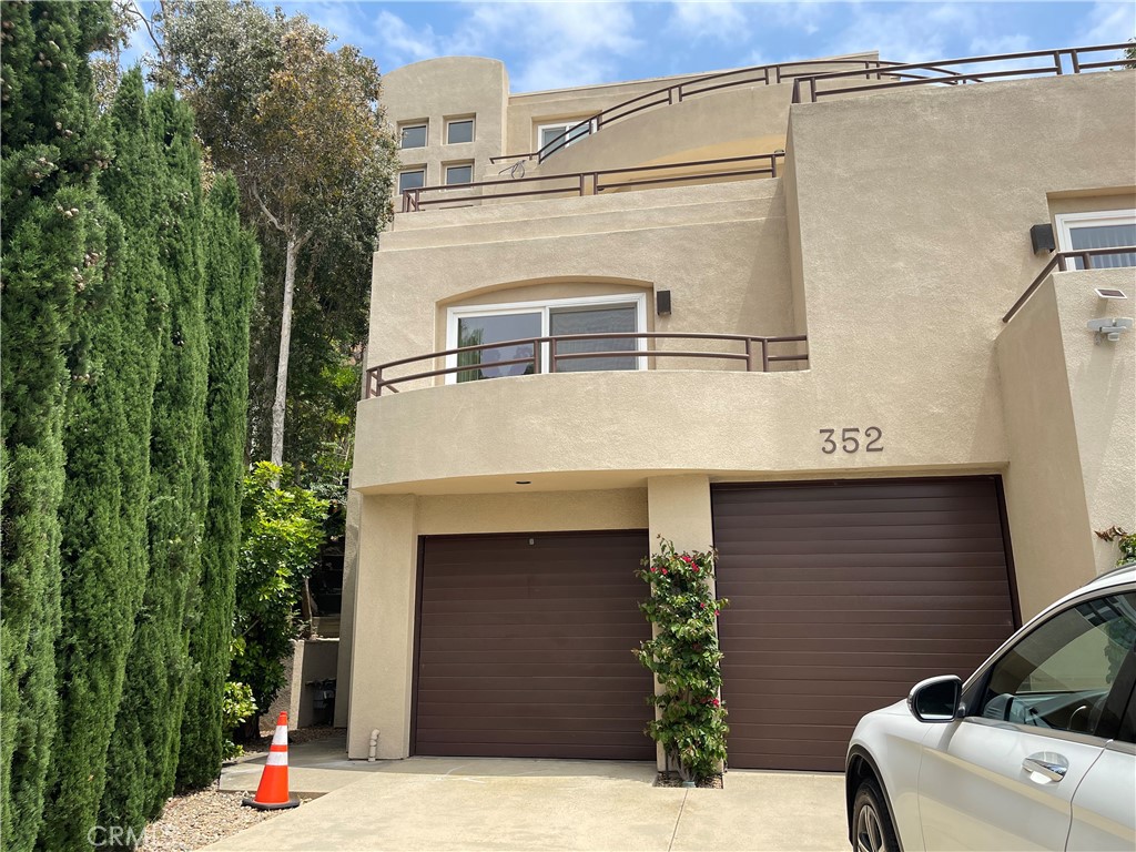 352 Y Place, Unit B Laguna Beach, CA 92651 - Photo 17 of 20 a view of entryway with a yard
