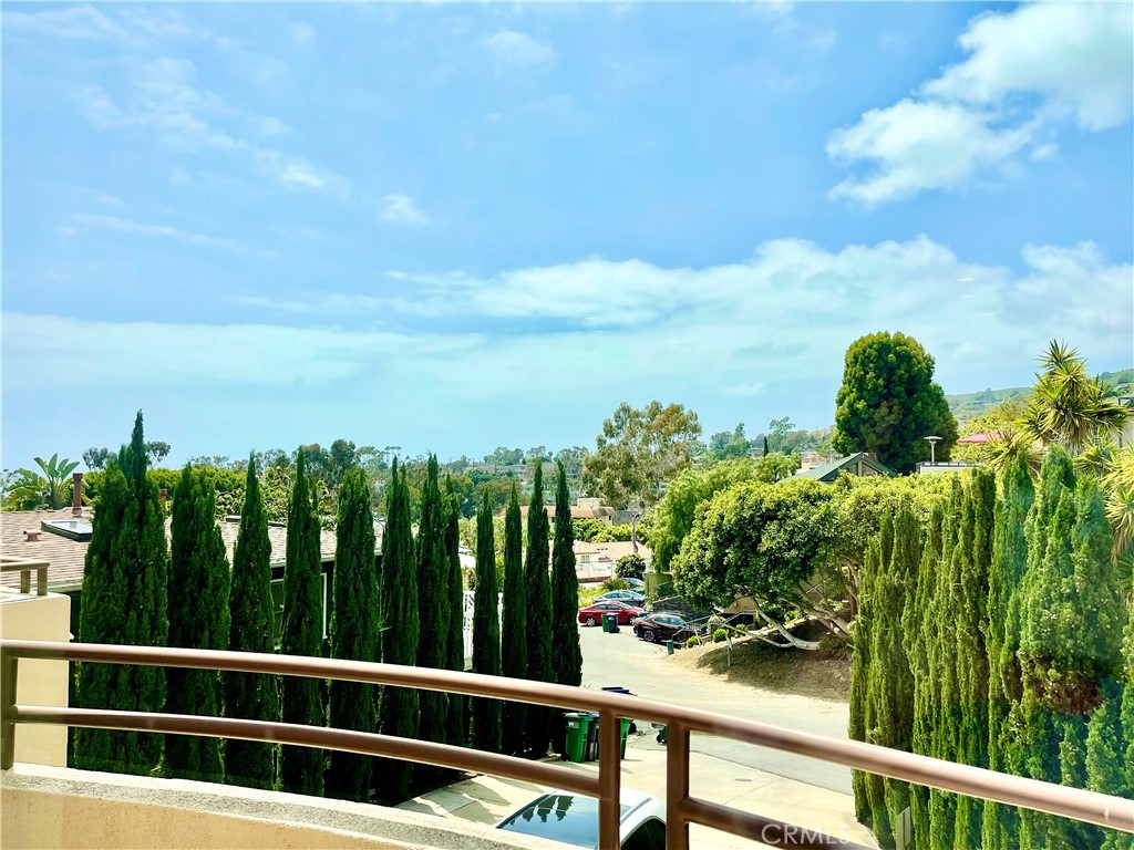 352 Y Place, Unit B Laguna Beach, CA 92651 - Photo 5 of 20 a view of a balcony with wooden floor