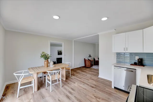 a kitchen with a sink stove and microwave