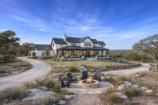 a view of a big house with big yard