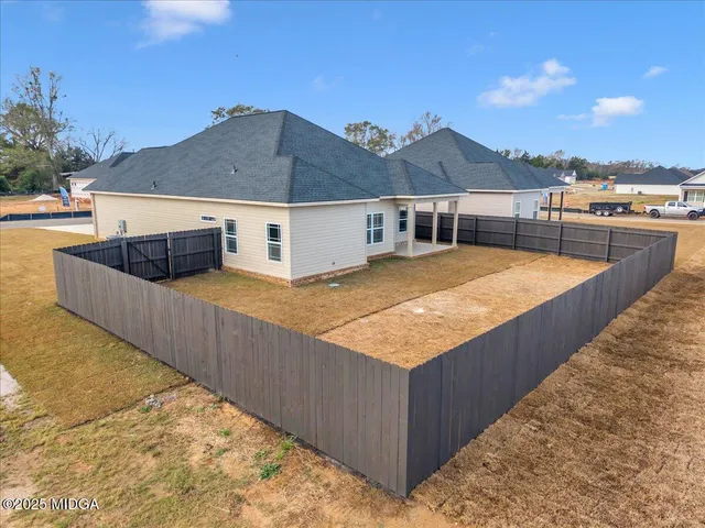 a view of a street with a building in the background
