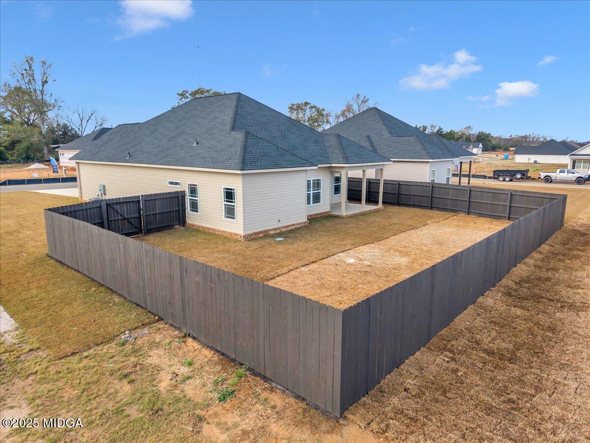 100 Early Drive Byron, GA 31008 - Photo 44 of 49 a terrace with a table and chairs