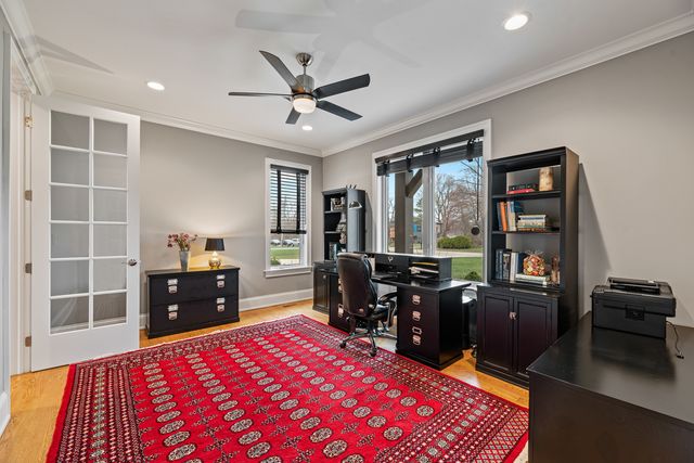 a bed room with a bed and a television