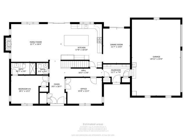 a front view of a house with a garden and plants