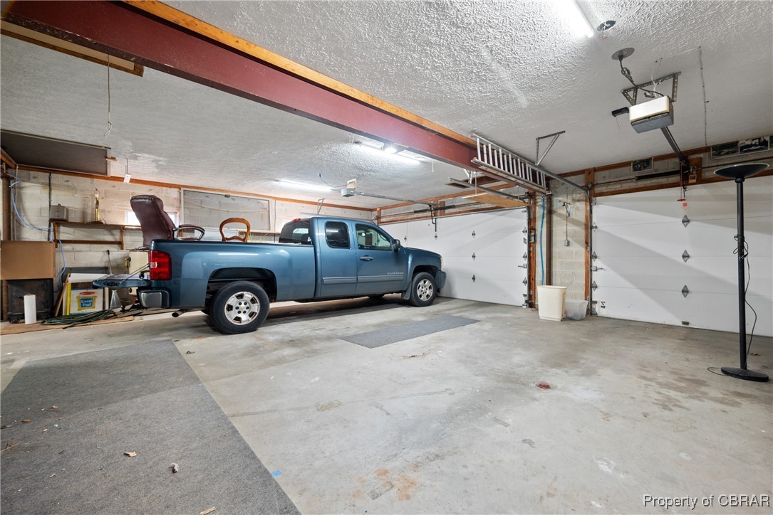 118 Paradise Point Road Yorktown, VA 23692 - Photo 30 of 50 Garage with a garage door opener