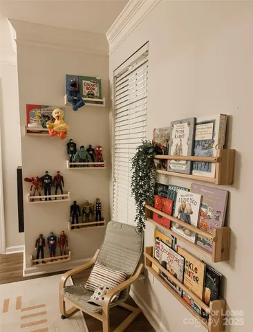 a room with furniture and a wooden floor