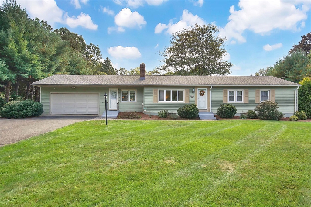 407 Wolf Swamp Road Longmeadow, MA 01106 - Photo 1 of 42 a view of a house with backyard and garden