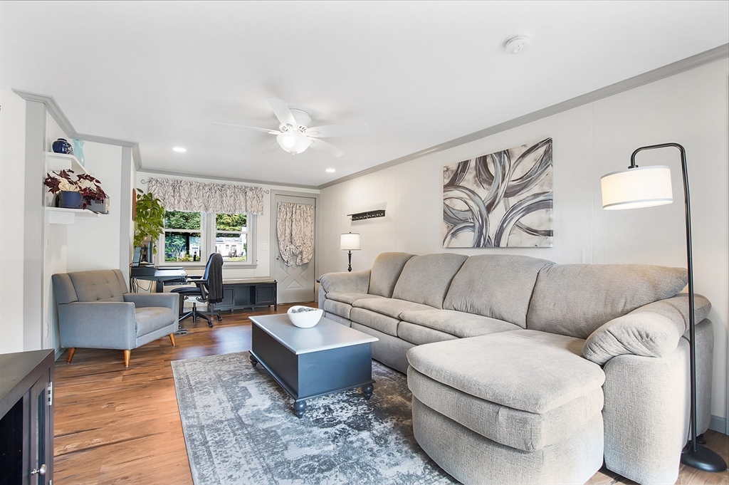 407 Wolf Swamp Road Longmeadow, MA 01106 - Photo 3 of 42 a living room with furniture and wooden floor