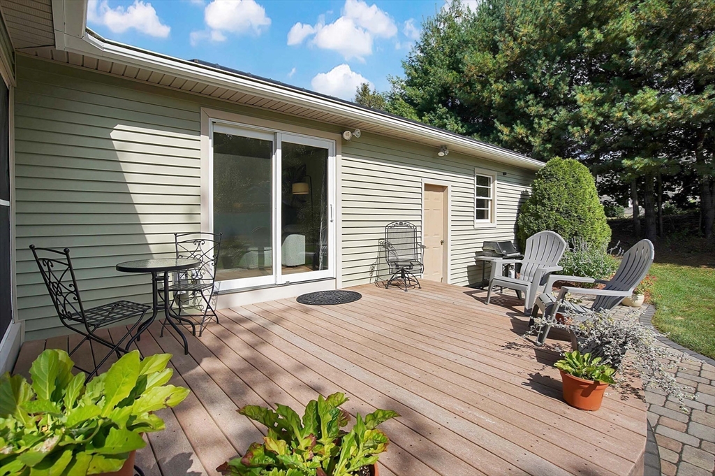 407 Wolf Swamp Road Longmeadow, MA 01106 - Photo 34 of 42 a front view of a house with patio